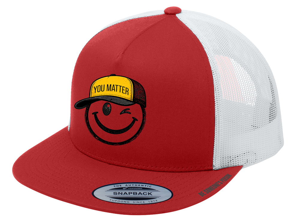 Gorras trucker "Tú importas" con carita sonriente