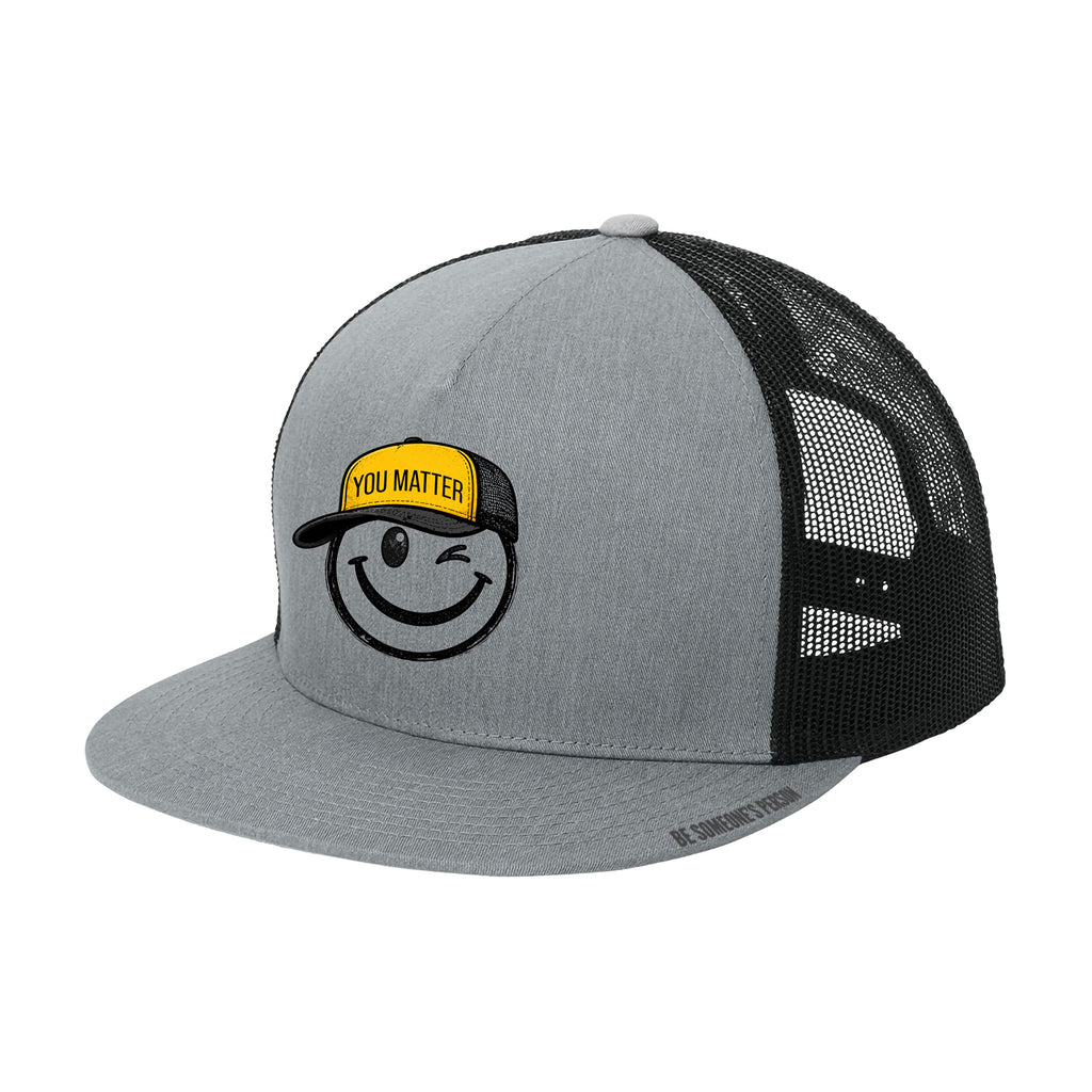 Gorras trucker "Tú importas" con carita sonriente